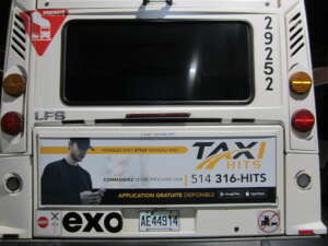 Publicité Taxi HITS Repentigny sur un autobus exo de Lanaudière